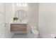 Modern powder room with floating vanity and elegant tile at 2635 Camp Branch Rd, Buford, GA 30519