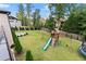 Large backyard with playset and trampoline at 2635 Camp Branch Rd, Buford, GA 30519
