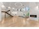 Open concept living room with high ceilings and a modern fireplace at 2635 Camp Branch Rd, Buford, GA 30519