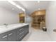 Modern bathroom with double vanity, soaking tub, and a sauna at 2635 Camp Branch Rd, Buford, GA 30519