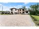 Stunning home with a large driveway and beautiful landscaping at 2635 Camp Branch Rd, Buford, GA 30519