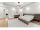 Main bedroom with hardwood floors, large windows, and ensuite bathroom at 2635 Camp Branch Rd, Buford, GA 30519