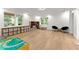 Finished basement playroom with hardwood floors and natural light at 2635 Camp Branch Rd, Buford, GA 30519