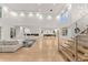Spacious living room with high ceilings, hardwood floors, and modern fireplace at 2635 Camp Branch Rd, Buford, GA 30519