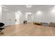 Spacious basement playroom with hardwood floors and plenty of room for toys at 2635 Camp Branch Rd, Buford, GA 30519
