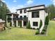 Luxury home with backyard, deck and landscaping at 2635 Camp Branch Rd, Buford, GA 30519