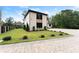 Modern two-story home with brick facade and landscaped lawn at 2635 Camp Branch Rd, Buford, GA 30519