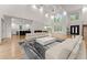 Open living area with high ceilings, a marble fireplace, and large windows at 2635 Camp Branch Rd, Buford, GA 30519