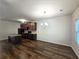 Modern kitchen with dark cabinets, granite countertops, and an island at 1827 Old Dogwood, Jonesboro, GA 30238