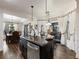 Kitchen with island, stainless steel appliances and breakfast nook at 180 Maddox Rd, Buford, GA 30518