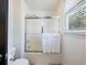 Simple bathroom with shower/tub combo at 180 Maddox Rd, Buford, GA 30518