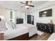 Spacious primary bedroom with large windows and ample dresser space at 180 Maddox Rd, Buford, GA 30518