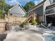 Multi-level deck with stonework surrounding the pool at 180 Maddox Rd, Buford, GA 30518