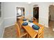 Bright dining room with wood table and kitchen view at 840 Brandy Oaks Ln, Stone Mountain, GA 30088
