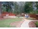 Fenced-in community pool with gate access at 840 Brandy Oaks Ln, Stone Mountain, GA 30088
