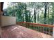 Wooden deck overlooking a wooded area at 840 Brandy Oaks Ln, Stone Mountain, GA 30088