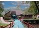 Community clubhouse with landscaping and walkway at 840 Brandy Oaks Ln, Stone Mountain, GA 30088