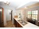 Kitchen with stainless steel appliances and view to the breakfast nook at 840 Brandy Oaks Ln, Stone Mountain, GA 30088
