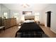 Main bedroom with plush carpet and large walk-in closet at 840 Brandy Oaks Ln, Stone Mountain, GA 30088
