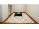 Spacious basement with large area rug and wood floors at 840 Brandy Oaks Ln, Stone Mountain, GA 30088
