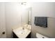 Clean bathroom with single vanity and updated fixtures at 840 Brandy Oaks Ln, Stone Mountain, GA 30088