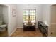 Small breakfast area with tile floor and window view at 840 Brandy Oaks Ln, Stone Mountain, GA 30088