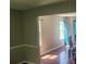 Bright dining room with hardwood floors and view into adjacent living area at 4769 Snap Creek Ln, Decatur, GA 30035