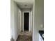 Clean hallway with patterned tile floor and access to bedrooms at 4769 Snap Creek Ln, Decatur, GA 30035