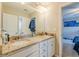 Double vanity bathroom with granite countertop and a view of bedroom at 113 Cottage Nw Walk, Cartersville, GA 30121