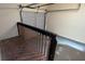 Garage with overhead door and a loft area at 5300 Forest Downs Ln, Atlanta, GA 30349