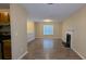 Spacious living room with hardwood floors and fireplace at 5300 Forest Downs Ln, Atlanta, GA 30349