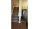 Indoor carpeted stairs leading to upper level at 5300 Forest Downs Ln, Atlanta, GA 30349