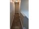 Upstairs hallway with hardwood floors at 5300 Forest Downs Ln, Atlanta, GA 30349