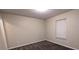 Spacious bedroom with neutral walls and carpet at 5300 Forest Downs Ln, Atlanta, GA 30349