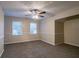 Spacious bedroom with ceiling fan and neutral wall colors at 2097 Kolb Ridge Sw Ct, Marietta, GA 30008