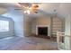 Large bonus room with built-in shelving and a fireplace at 2097 Kolb Ridge Sw Ct, Marietta, GA 30008