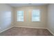 Charming bedroom with neutral walls and carpet flooring at 2097 Kolb Ridge Sw Ct, Marietta, GA 30008