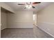 Well-lit bedroom with ceiling fan and access to bathroom at 2097 Kolb Ridge Sw Ct, Marietta, GA 30008