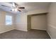 Bright bedroom featuring a ceiling fan and large window at 2097 Kolb Ridge Sw Ct, Marietta, GA 30008