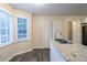 Kitchen with granite counters, white cabinets, and a breakfast nook at 2097 Kolb Ridge Sw Ct, Marietta, GA 30008