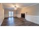 Spacious living room featuring a brick fireplace and hardwood floors at 2097 Kolb Ridge Sw Ct, Marietta, GA 30008