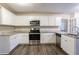 Updated kitchen featuring white cabinets, granite counters, and stainless steel appliances at 2097 Kolb Ridge Sw Ct, Marietta, GA 30008