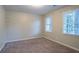 Simple bedroom with neutral walls and carpet flooring at 2097 Kolb Ridge Sw Ct, Marietta, GA 30008