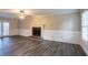 Living room with fireplace, wainscoting, and hardwood floors at 2097 Kolb Ridge Sw Ct, Marietta, GA 30008