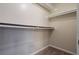 Large walk-in closet with double hanging rods and shelves at 2097 Kolb Ridge Sw Ct, Marietta, GA 30008