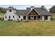 Large backyard with spacious patio and plenty of green space at 4165 Milford Trl, Cumming, GA 30028