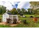 Rustic backyard with chicken coops and beehives at 4165 Milford Trl, Cumming, GA 30028