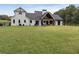 Spacious backyard with large patio and plenty of green space at 4165 Milford Trl, Cumming, GA 30028
