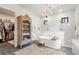 Large bathroom with a soaking tub, double vanity, and walk-in shower at 4165 Milford Trl, Cumming, GA 30028