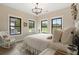 Bright bedroom with large windows and a comfortable bed at 4165 Milford Trl, Cumming, GA 30028